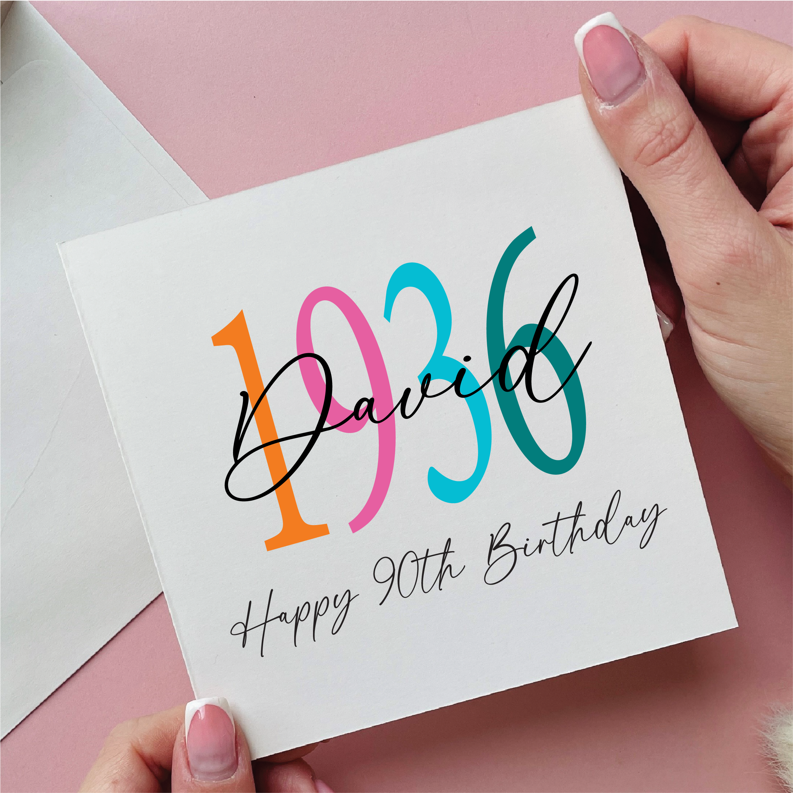 Hand holding a 90th Birthday Card