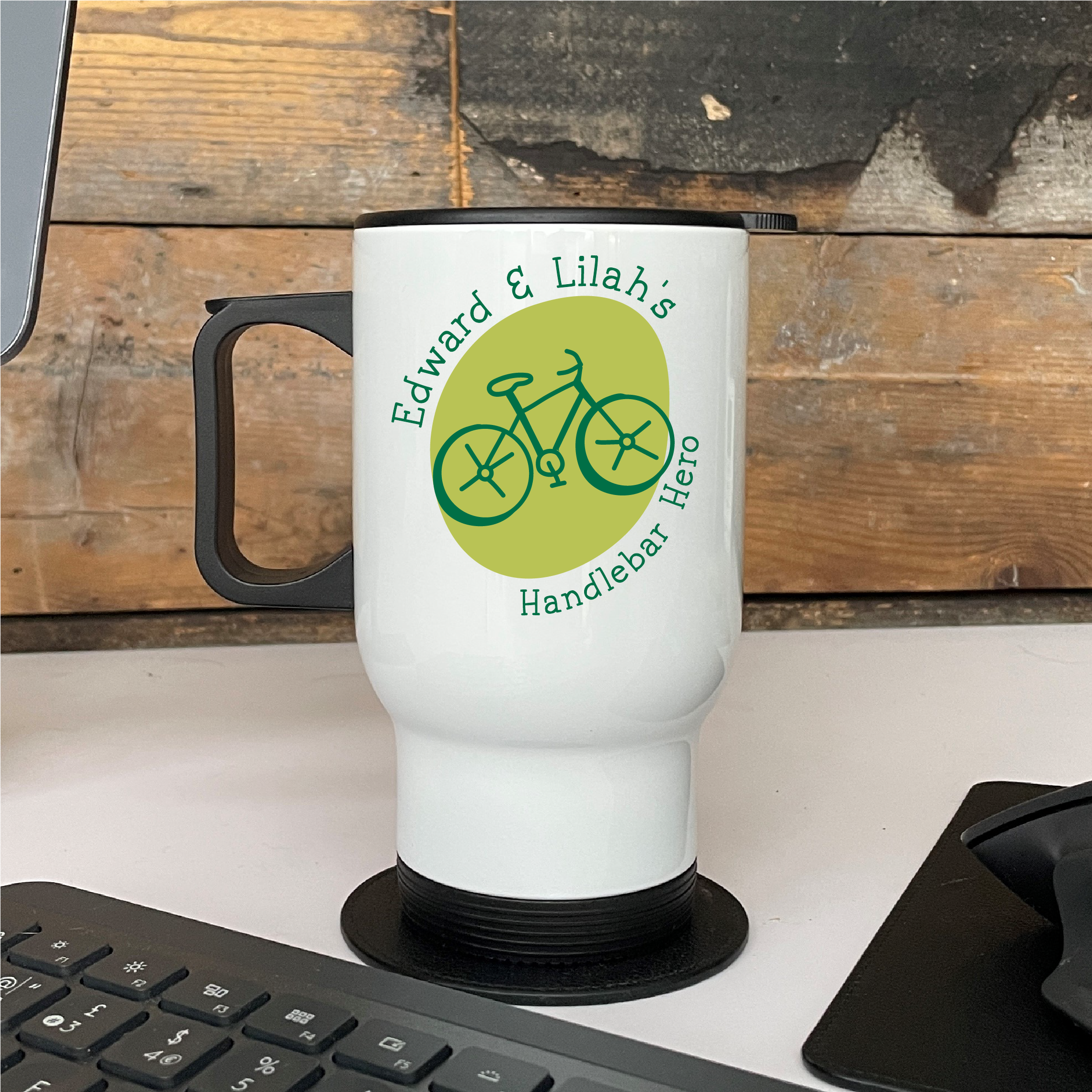 White travel mug with bicycle design for dad.