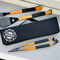 Set of barbecue tools with personalized case on a gray surface