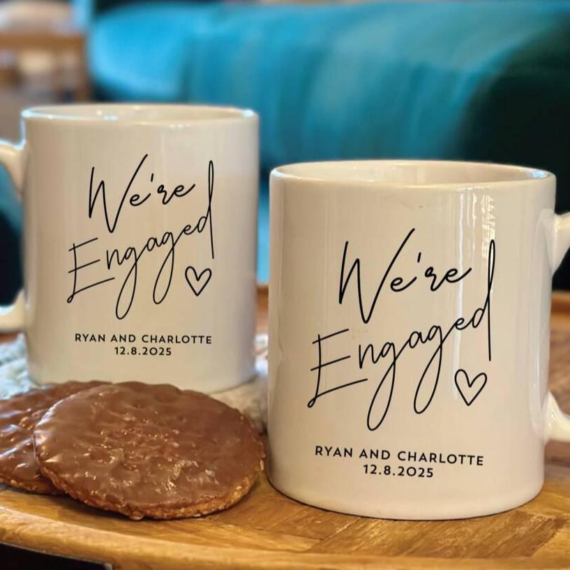 Set Of Two Personalised We're Engaged Mugs